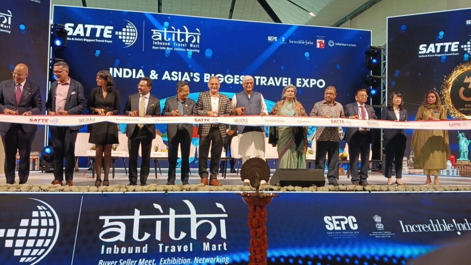Gajendra Singh Shekhawat inaugurating SATTE 2026 at Yashobhoomi, New Delhi, showcasing international tourism exhibition stalls.